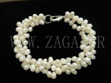 Bracelet perles de culture blanches torsad&eacute;