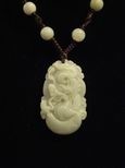 Collier jade signe chinois dragon