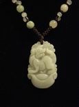 Collier jade signe chinois chien