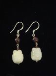 Boucles d`oreille jade fleurs de lotus