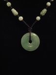 Collier jade m&eacute;daillon de protection