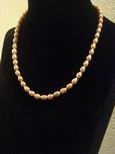 Collier perles de culture ovales roses fonc&eacute;s 6-7mm