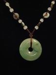 Collier jade m&eacute;daillon de protection