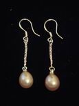 Boucles d`oreille perles de culture pendantes roses