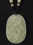 Collier jade m&eacute;daillon dragon et ph&eacute;nix