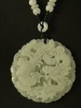 Collier jade m&eacute;daillon dragon et ph&eacute;nix