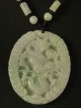 Collier jade m&eacute;daillon dragon