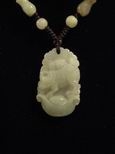 Collier jade signe chinois boeuf